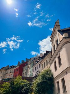 a row of buildings with a blue sky in the background
